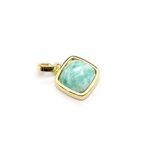 Detail view of square gold-toned pendant with a faceted Amazonite natural stone.