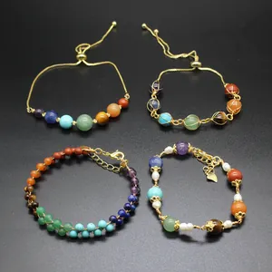 Detail showing four styles of 7 chakra natural stone and 14K gold-filled bracelets.