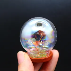 Macro detail of rainbow iridescent glass dome featuring natural stone tree of life