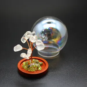 Detailed miniature natural stone tree of life ornament with protective glass dome