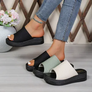 Close-up of women's ribbed fabric platform slides in three stylish colors