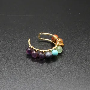 Handmade 14K gold filled cuff featuring seven colorful chakra natural stone beads.