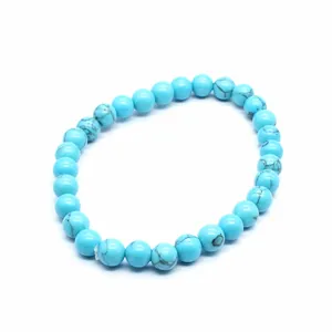 Detailed view of 6mm turquoise round bead bracelet with unique black matrix veins