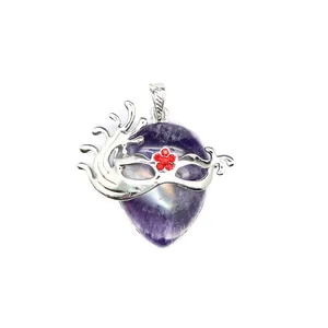 Detail of teardrop amethyst pendant with silver masquerade mask and red crystal flower