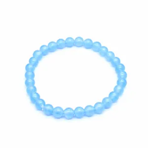 Detail shot of light blue 6mm natural stone round bead bracelet on white background.