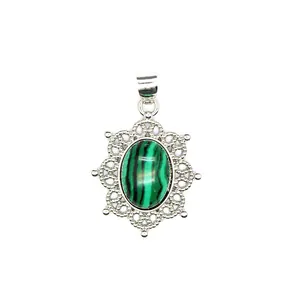 Detailed view showing the ornate silver lace setting and green malachite style oval stone