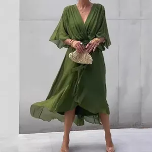 Elegant olive green V-neck dress featuring butterfly sleeves and a cinched waist chic
