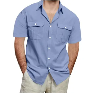 Close-up detail of men's light blue cotton linen shirt with double button pockets