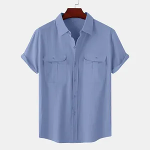 Detail view of light blue men's cotton linen short sleeve shirt with double pockets