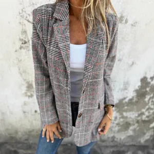 Detail view of women's vintage plaid blazer with classic Glen check pattern and notch lapel