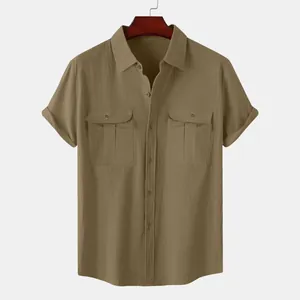 Macro view showing the texture of a khaki men's short-sleeved cotton linen shirt with pockets
