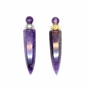 Detail view of natural amethyst hexagonal cone perfume bottle pendants with metal tops