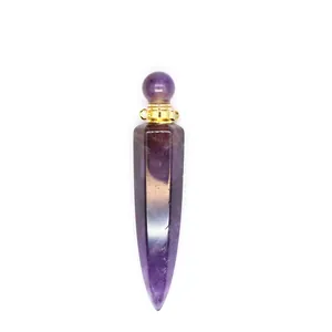 Macro detail of a hexagonal cone amethyst aromatherapy perfume bottle pendant.