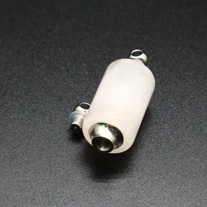 Detailed view of a cylindrical natural crystal essential oil bottle pendant with metal screw cap