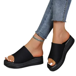 Stylish black fabric platform slide sandals for women, casual summer wedge footwear.