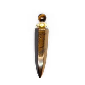 Detail of tiger eye stone perfume bottle pendant with hexagonal shape and gold top