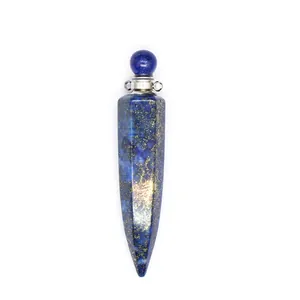 Macro view of blue lapis lazuli hexagonal perfume bottle pendant with gold flecks