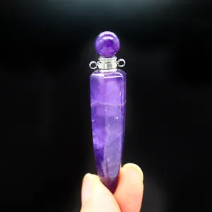 Natural amethyst hexagonal cone perfume bottle pendant for essential oils and jewelry.