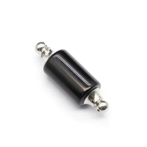 Macro view of a cylindrical black stone essential oil bottle pendant with silver caps