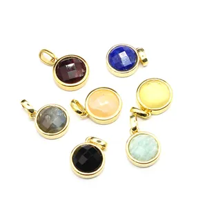 Selection of colorful faceted natural gemstone pendants with gold plated bezels