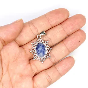 Elegant natural blue dot stone oval pendant with ornate hollow silver flower frame