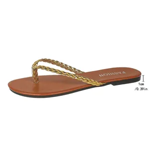 Stylish brown flat beach flip-flops for women with gold braided straps and 1cm sole