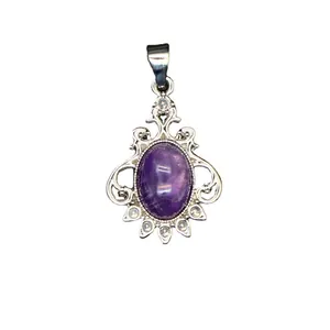 Vintage style silver plated amethyst crystal pendant with intricate floral filigree border