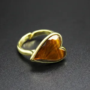 Vintage heart-shaped Tiger's Eye ring with adjustable gold-toned band for women.