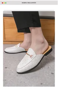 Men's white British style mule loafers with elegant diamond pattern and gold buckle detail.