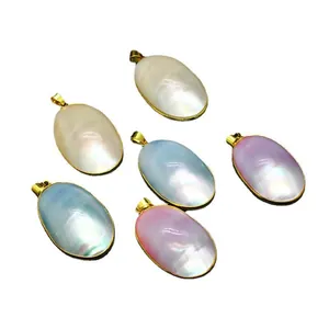 Natural oval mother of pearl shell pendants with gold plated bail in various colors