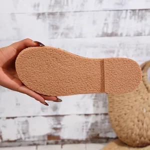 Detailed macro view of the non-slip rubber outsole on a vintage style women's flat shoe