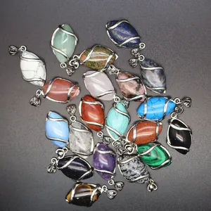 A varied collection of marquise-cut natural stone pendants with silver wire wrap details