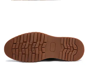 Close-up detail of durable brown rubber outsole with anti-slip lug pattern