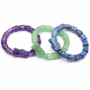 Handgeschnitzte Drachenkopf-Armbänder aus Amethyst, grünem Aventurin und Lapislazuli.