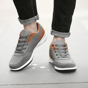 Fashionable men's lightweight grey and brown sneakers with synthetic leather waterproof finish