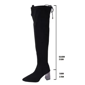Detail showing 55cm shaft height and 7cm chunky heel on black suede over-the-knee boots