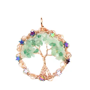 Detail view showing the wire-wrapped Tree of Life pendant with green stone leaves