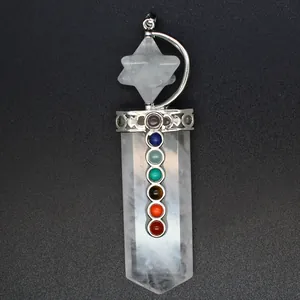 Detailed view of 7 chakra stones and Merkaba star on a clear quartz sword pendant.