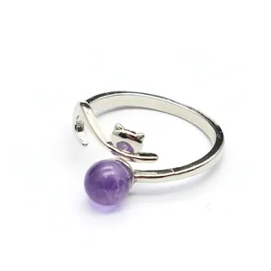 Close-up view of a silver fox-shaped open ring featuring a round purple amethyst stone