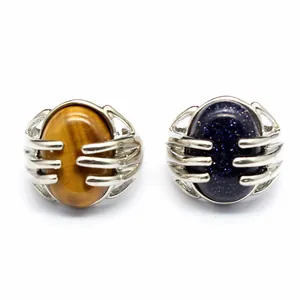 Unique hand-grip rings featuring tiger eye and blue sandstone on adjustable silver bands