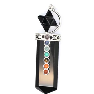 Detailed view of 7 chakra stones on a black obsidian sword-shaped Merkaba pendant.