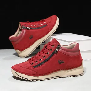 Detailed view of handmade red suede casual flat shoes with side zipper for women