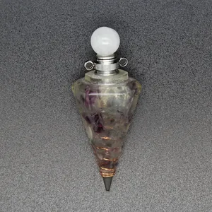 Detailed view of a hexagonal resin cone pendant with tourmaline and copper coil