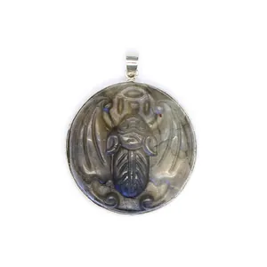 Exquisite hand-carved natural labradorite stone pendant featuring blue flash in silver bezel