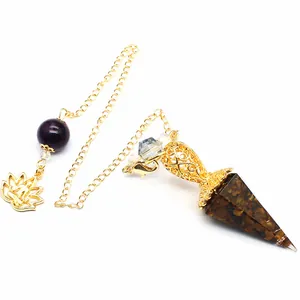 Detailed view of hexagonal pyramid pendulum pendant with tiger eye crystal stones
