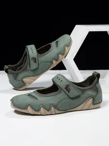 Sporty Mary Jane women's sandals in green with adjustable hook and loop strap detail