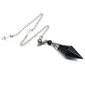 Close-up of hex hexagonal blue sandstone dowsing pendulum with silver chain and clear beads.