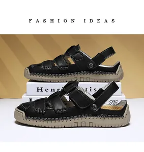 Detail view of black leather sandals with durable beige soles and secure Velcro straps.