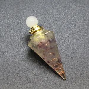 Detailed view of hexagonal resin cone pendant with tourmaline and copper coil