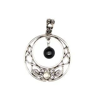 Macro view of a retro hollow round moon pendant featuring a black natural stone bead